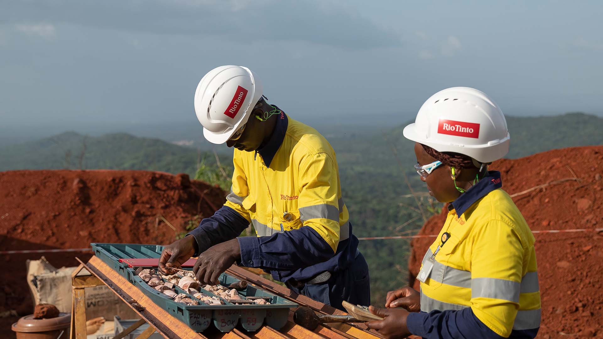 Employees at work measuring samples at Ouleba site, Simandou Guinea