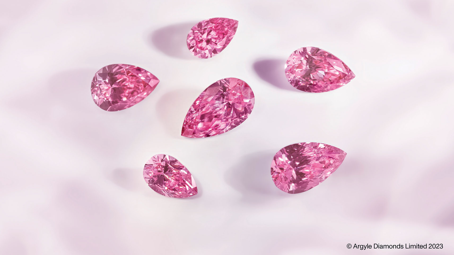 6 ethereal Fancy Vivid Purplish Pink and Purple-Pink Pears from the Beyond Rare™ Tender: The Art Series Born of this World collection