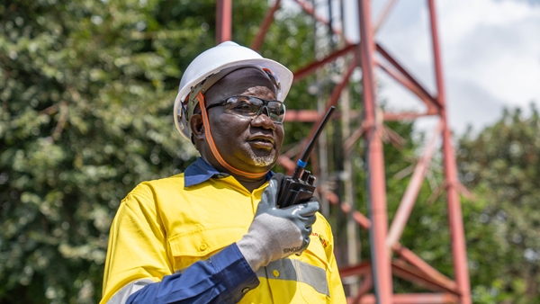 Bangaly, the Radio Superintendent at the Simandou project in Guinea, radios in from a tower at Canga. 