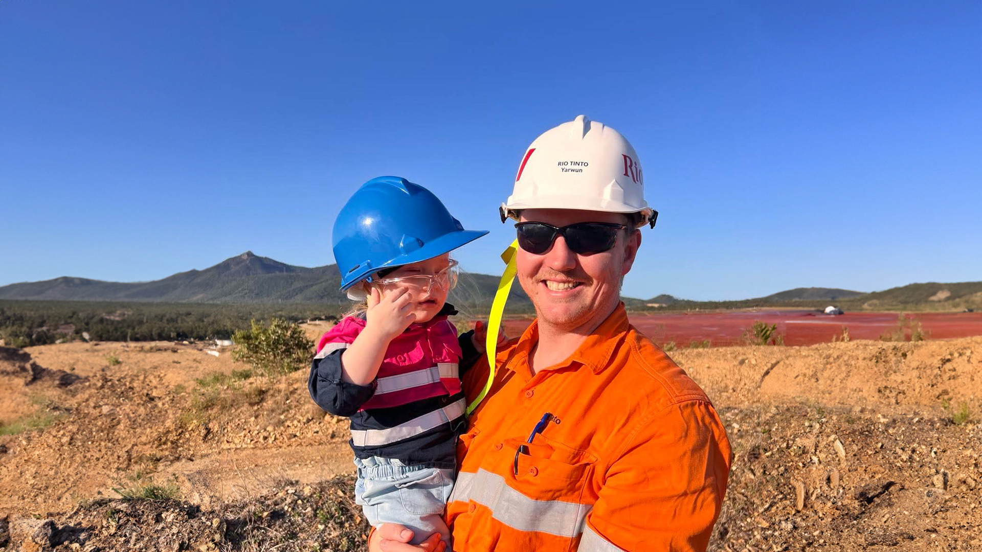 Brandon, our Maintenance Superintendent, Digestion at Yarwun holding his daughter