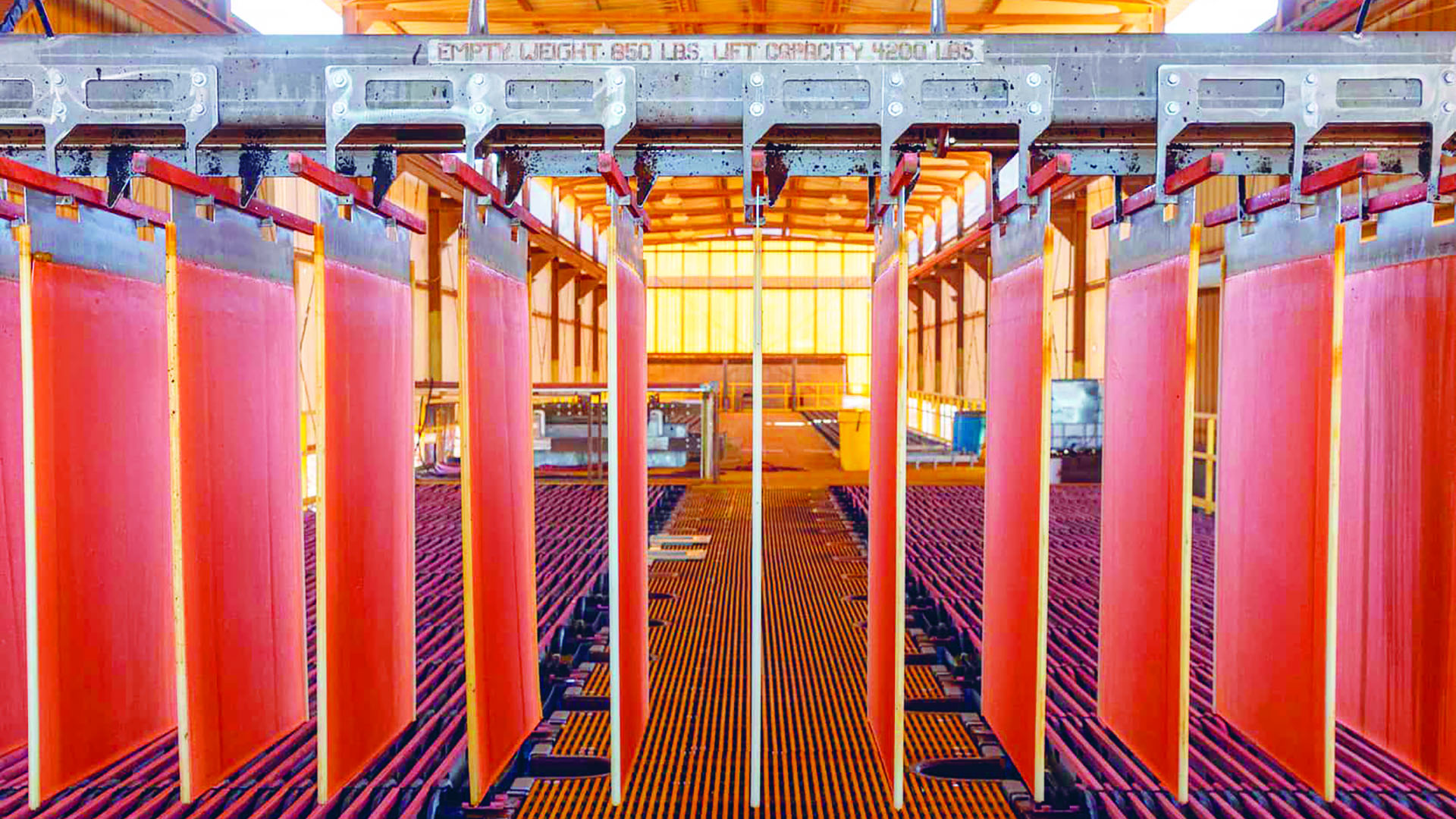 Series of Nuton copper plates hanging from holders